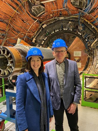 Two professor standing in front of DELPHI Experiment at CERN, Geneva