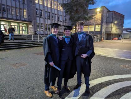 three physics graduates, in front of Kane Building, Conferrings UCC