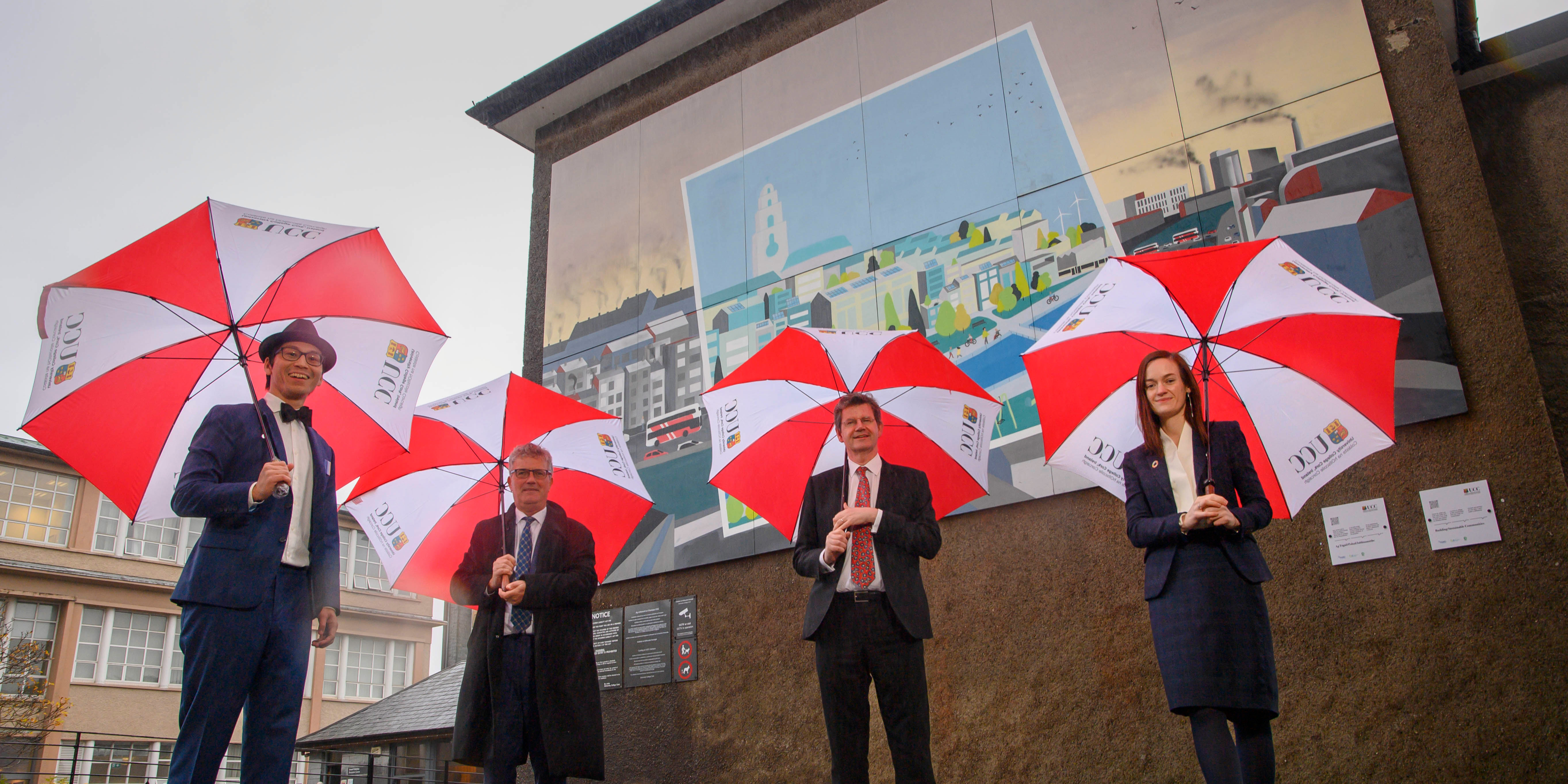 Pictured at UCC’s sustainable communities mural are:  The British Ambassador to Ireland, H.E Mr Paul Johnston, Professor John O’Halloran, UCC President and UCC COP26 delegation members Dr Kian Mintz-Woo and Dr Marguerite Nyhan.