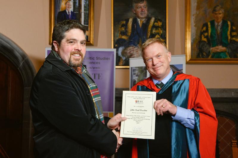 John Creedon from CK118 receiving his Quercus College Scholarship from Prof. Chris Williams, Head of College of Arts, Celtic Studies & Social Sciences, University College Cork
