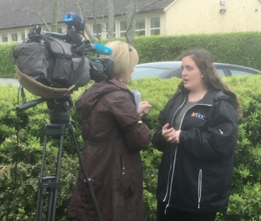A student being interviewed about the new Gaeltacht module by TG4