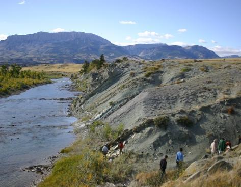 BSc IFG Students studying a Cretaceous sedimentary sequence at Sun River, Montana, with the Rocky Mountain Front in the background.