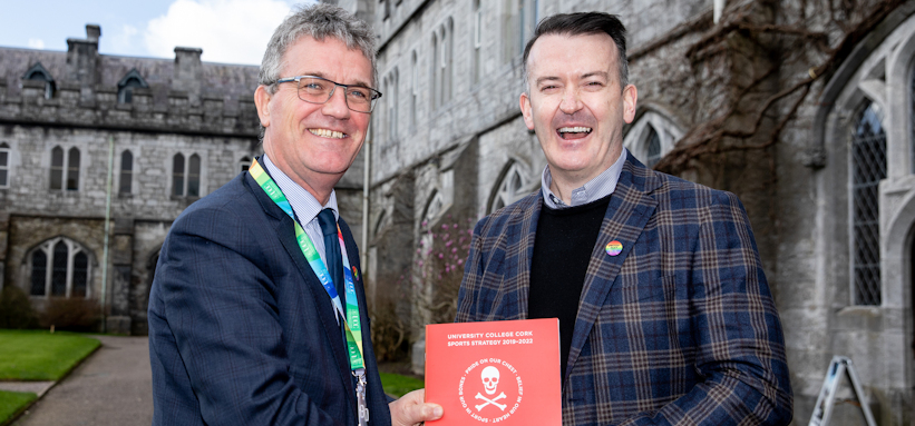 Deputy President & Registrar Professor John O’Halloran presents Cork hurling legend Dónal Óg Cusack with the recently launched UCC Sports Strategy 