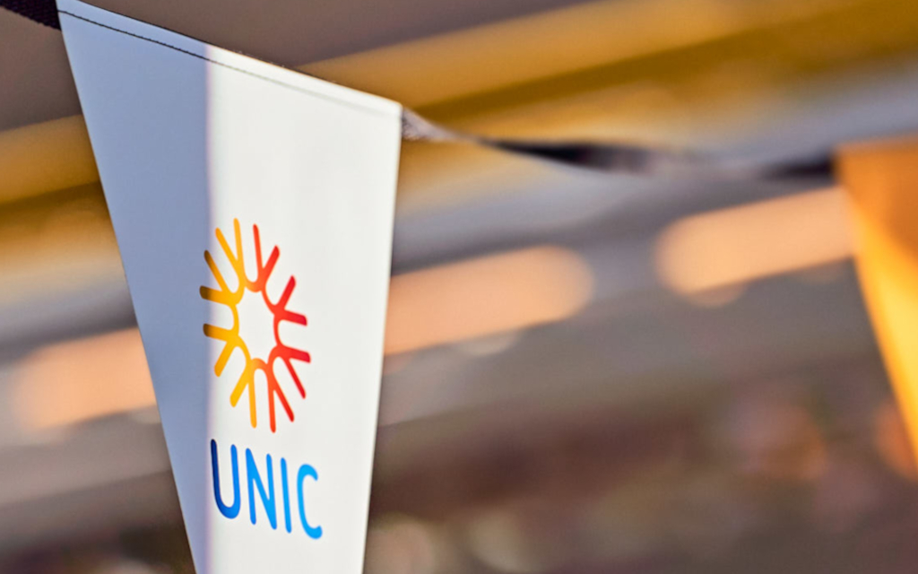 Banner image featuring UNIC bunting