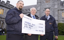 UCC Security Services present cheque to Marymount Hospice