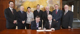Photographed were: (Seated L-R) President of UCC, Dr Michael Murphy, and Cork City Chief Executive Tim Murphy, with (standing L-R) Éanna Buckley, Club Administrator, Cork City FC, Diarmuid Collins, UCC Bursar and Chief Financial Officer, UCC, Christine O'Donovan, Director of Physical Education & Sport (Acting), Mick Ring, Chairman, Cork City FC, Pat Lyons, Cork City FC Infrastructure Working Group, Trevor Holmes, Vice-President for External Relations, UCC and Patsy Ryan, General Manager, Mardyke Arena UCC. Photo by Tomas Tyner, UCC.