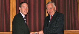 Dr Robert Ryan receiving his award from Richard Marsh, Director of Sales at Oxoid Ltd and Thermo Scientific