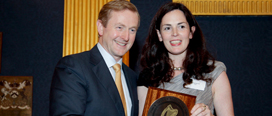 Ms Cliona Hannon, Chair of the DARE HEAR Strategic Development Group pictured receiving a Public Service Excellence Award from An Taoiseach, Enda Kenny, TD 