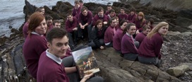 Students of Schull Community College, Co. Cork, pictured with a copy of The Atlas of the Great Irish Famine outside Fastnet Marine and Outdoor Education Centre. Picture by Clare Keogh. 