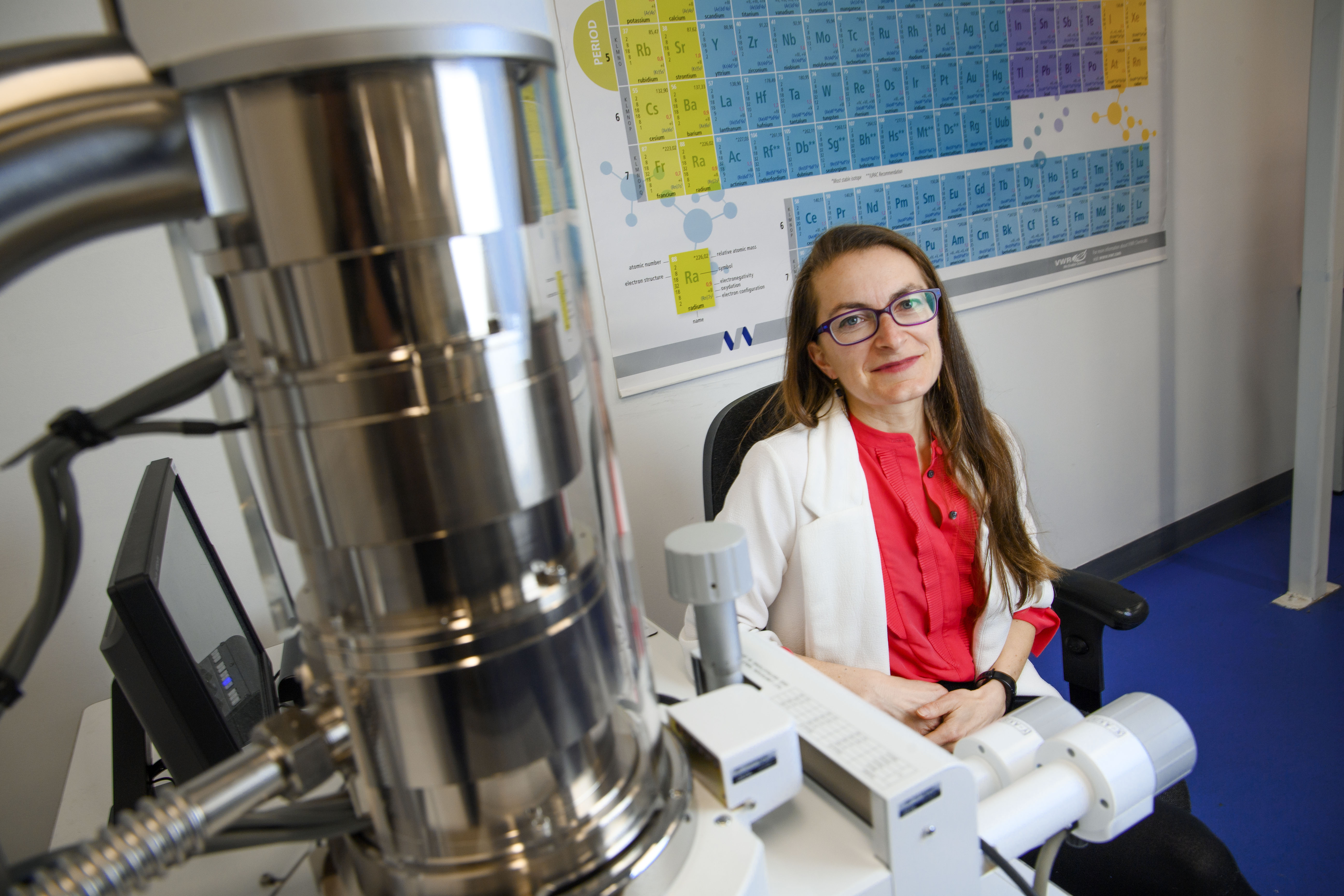 A woman in a labcoat