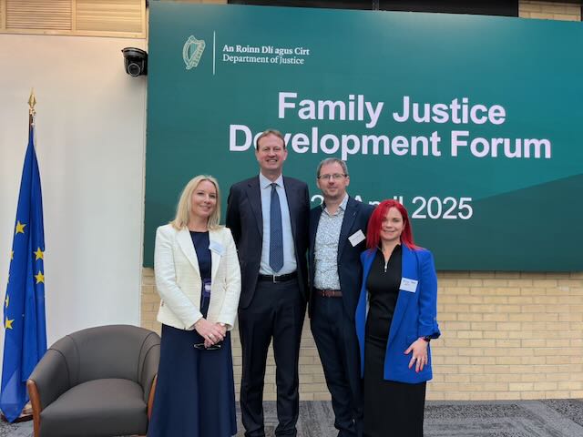 Picture of the research team with the Minister for Justice