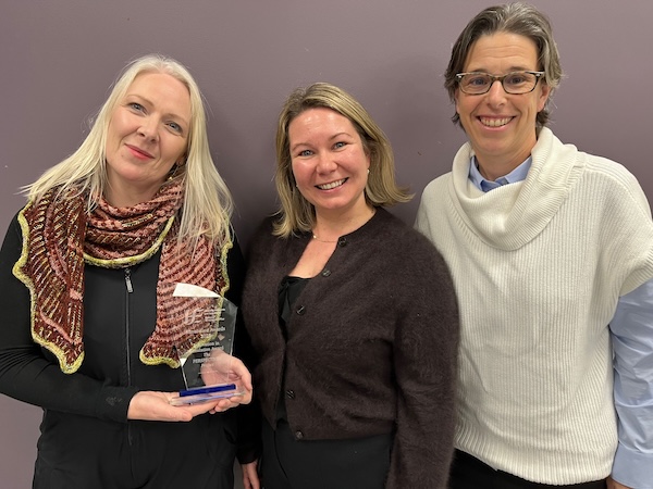 Members of the PERSECTIVES project team collecting the award. 