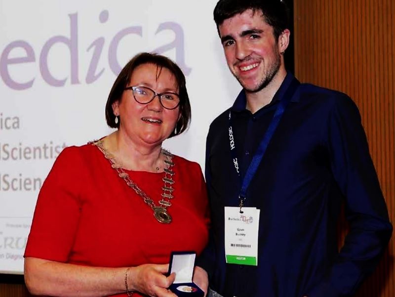 Bernie Quirke, President of the Academy of Clinical Science and Laboratory Medicine, presenting the President's Prize to Gavin Buckley, BSc Biomedical Science (UCC/MTU), at the BioMedica Science Annual Conference.