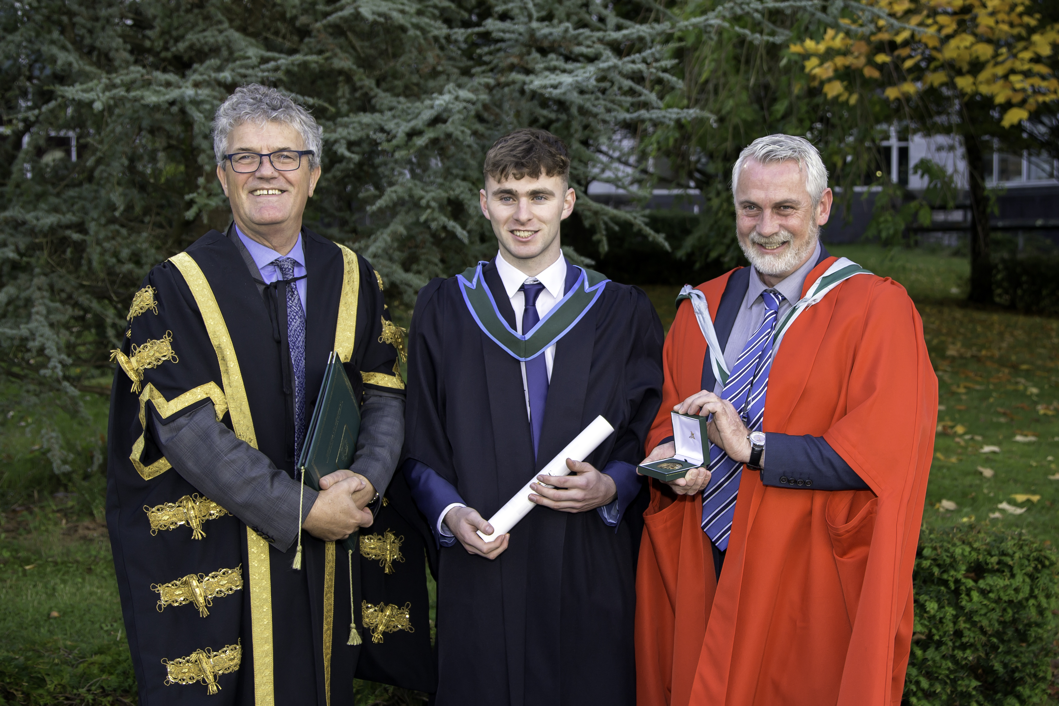 Professor John O'Halloran, president of UCC; Donagh Gribbon, winner of the Art Champlin Gold Medal Award; and Professor Justin McCarthy, School of Biochemistry and Cell Biology