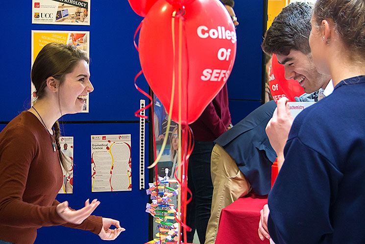 School of Biochemistry and Cell Biology ambassador & Fourth Year Biochemistry student and, Aisling Flood talking to Leaving Certificate students at UCC Open Day about the BSc in Biochemistry.