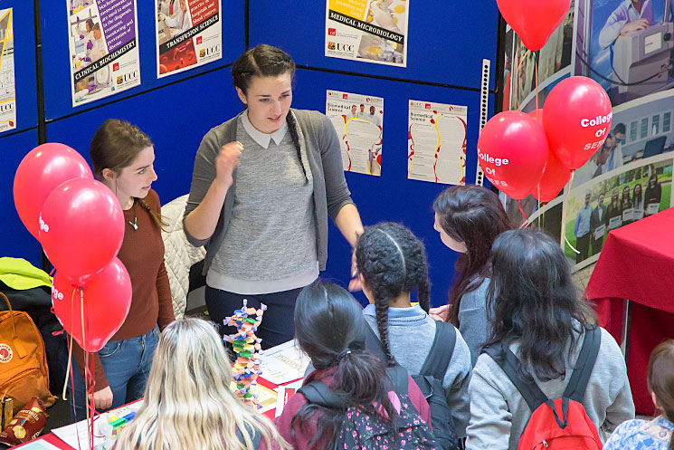Secondary School students interested in studying Biochemistry discuss their futures with Biochemistry student ambassadors, Aisling Flood and Naomi Hanrahan, at the Biochemistry and Cell Biology stand at UCC Open Day 2017.