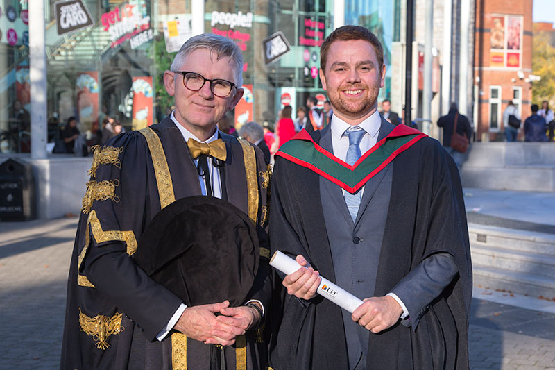 Professor Patrick O'Shea, President of UCC with BSc (Hons) in Biomedical Science graduate of 2018, David Duggan.