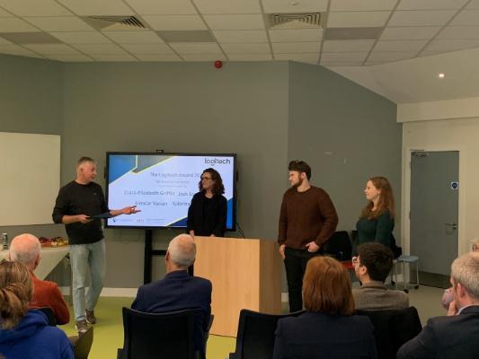 Denis O’Keeffe present inaugural prize for research excellence in a Final Year Project to Jack Leonard and Sabrina Ziefer for their project 'Bugs, Beeps & Blips: Investigating Flow States using Experience Sampling Methods in Students'. From left to right: Denis O’ Keefe (Logitech), Sarah Foley (SoAP), Jack Leonard and Sabrina Ziefer.