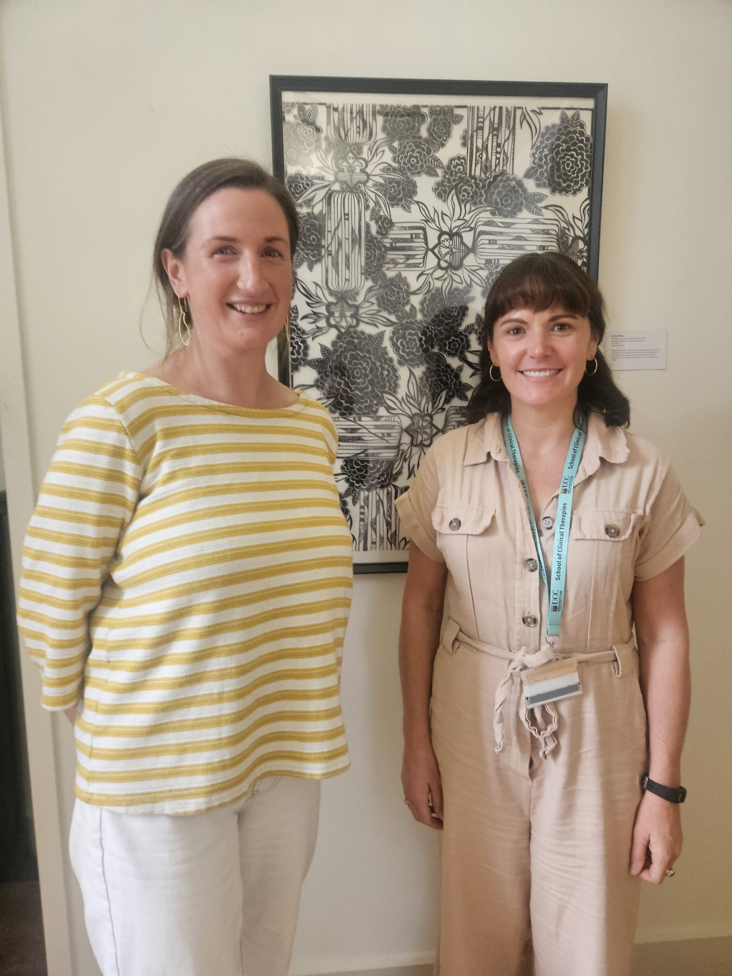Picture of two female lecturers infront of a beige wall Picture of two female lecturers infront of a beige wall
