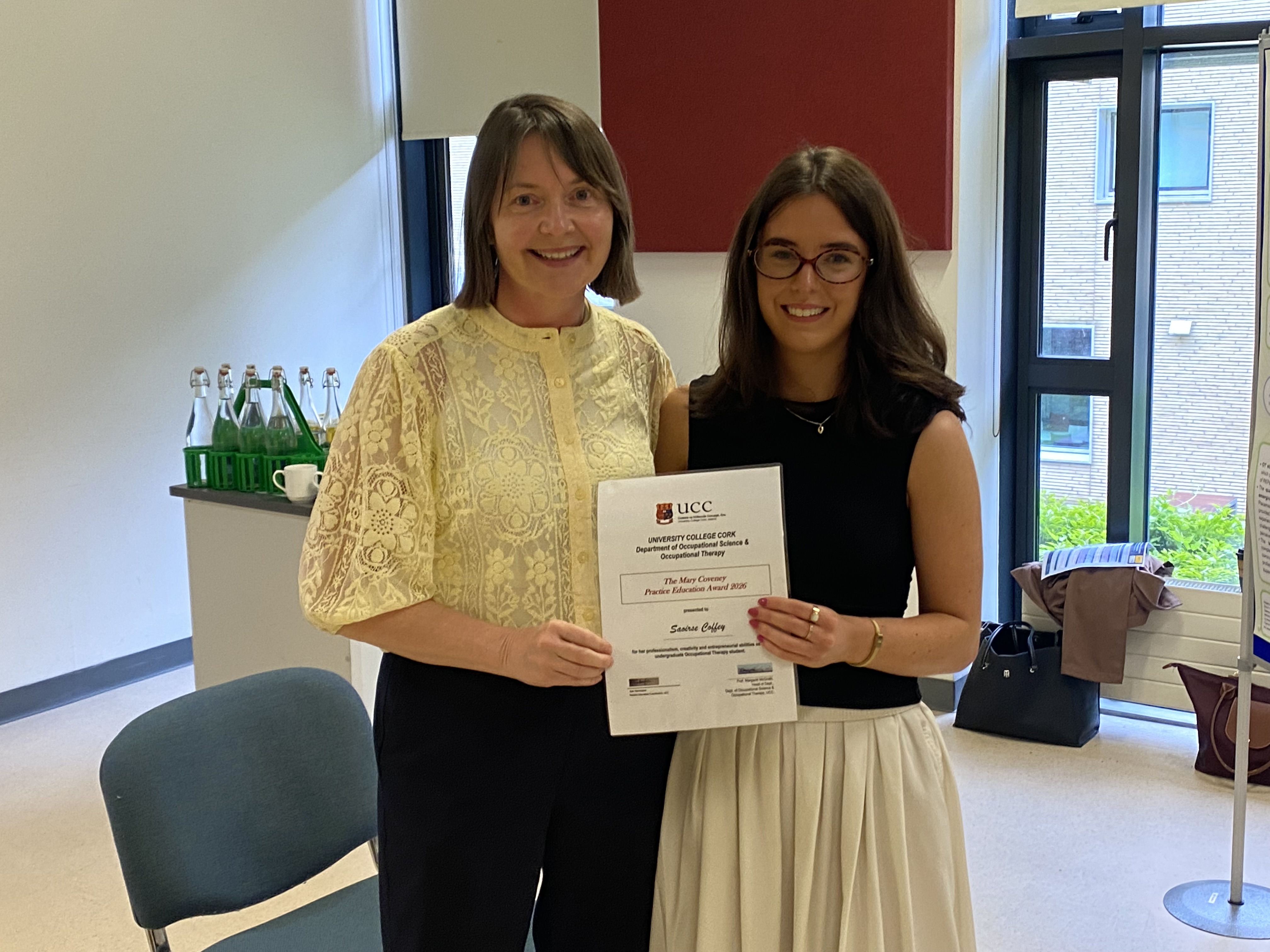 OT Research Poster Day Mary Coveney Award being presented to student