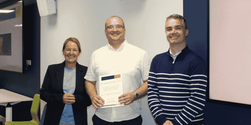 Dr Fergal O’Connor receiving an award