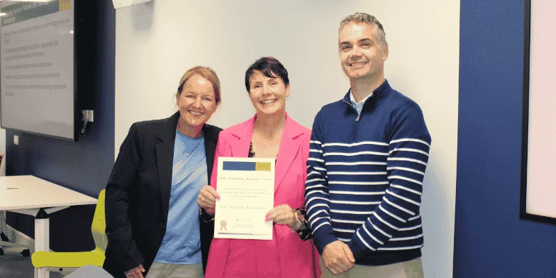 Dr Linda Murphy receiving an award