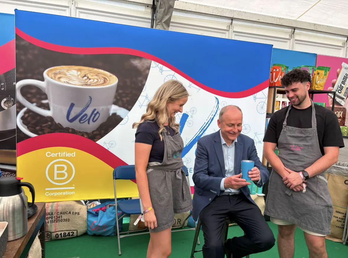Two students with Taoiseach Micheál Martin talking