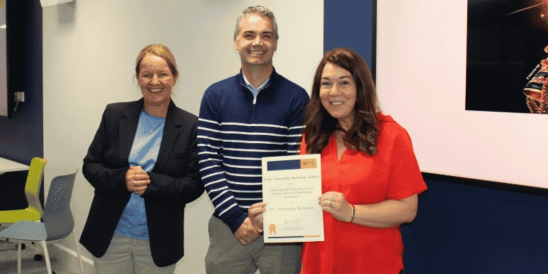 Dr Wendy Rowan receiving an award