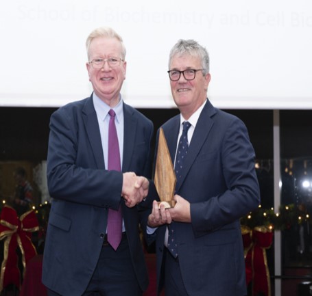 Dr Declan Kennedy receiving Long Service Award from Professor John O'Halloran, UCC President