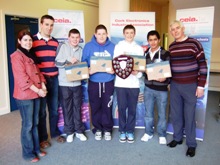 Coláiste Chríost Rí, seen here receiving the UCC shield and an eMachines EM350 netbook each, kindly sponsored by CEIA. (Photo L-R: Ms. Deirdre deBhailis, CEIA; Mr. David Mahony, Paul Ryan, Cian Donnellan, David Barry, Vaibhav Tandon, Mr. Sean Culhane)