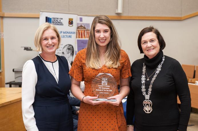 Ms Laura Cummins receives the Graduate of the Year 2018 Award from Dr Clodagh Harris