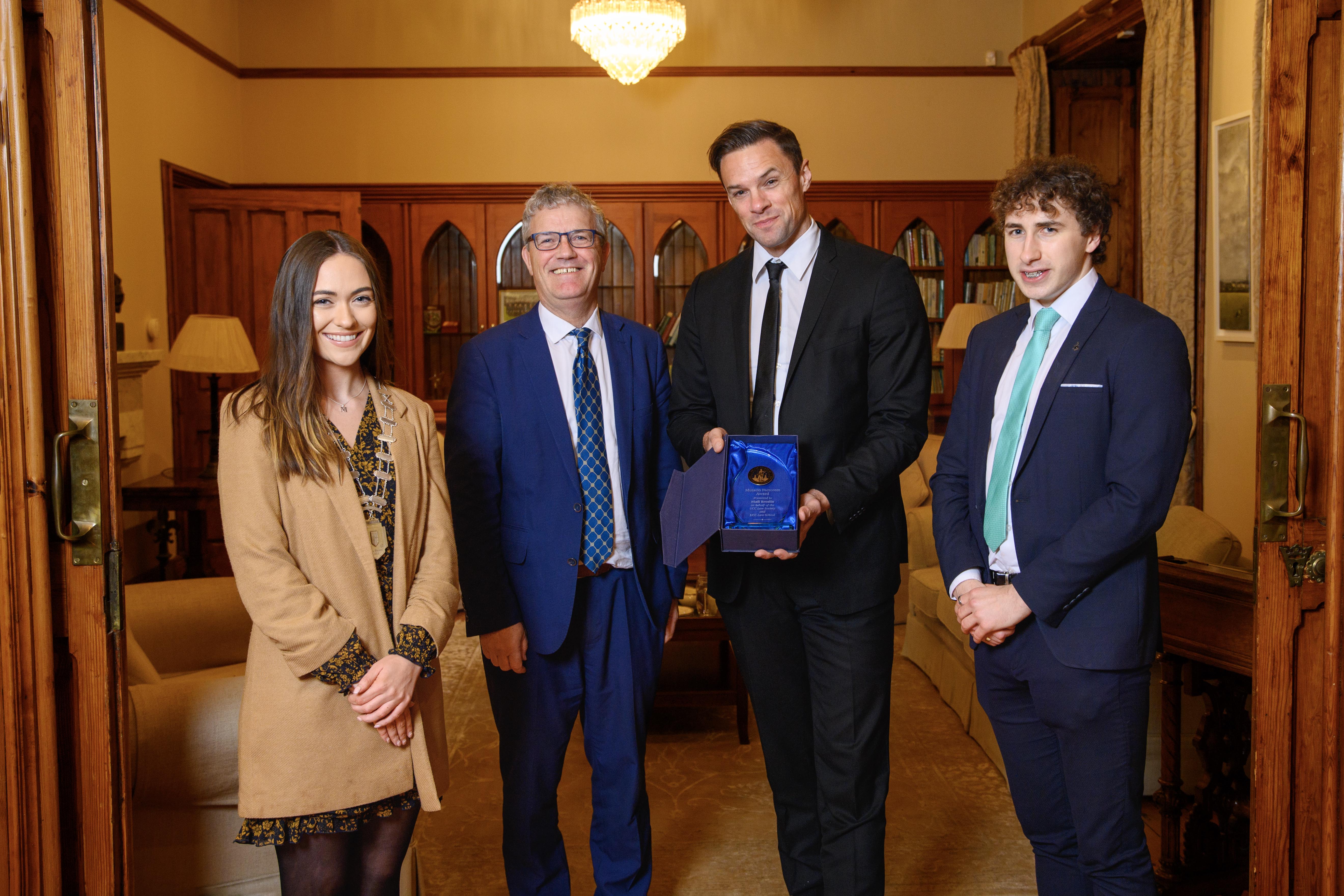 Mental Health Advocate and Musician Niall Breslin, 'Bressie', presented with the Mutatio Factorem award by UCC Law Society