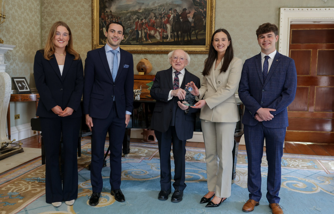 President Michael D Higgins presented with the Mutatio Factorem award by UCC Law Society
