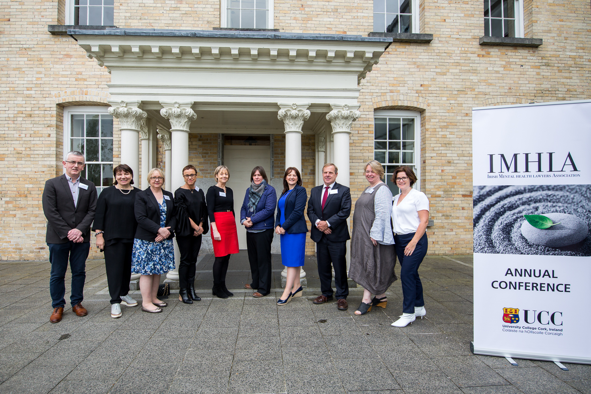 Speakers from the Mental Health and Capacity Law Conference gather outside the School of Law