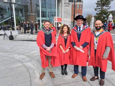 Staff pose in robes