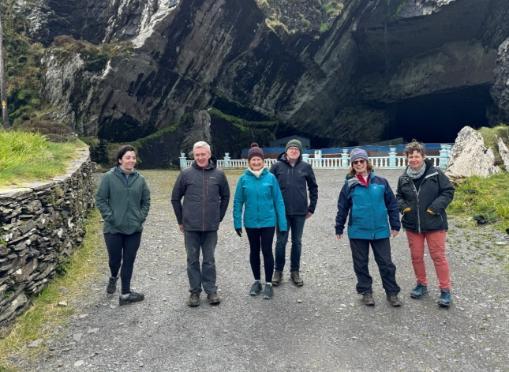 Group standing in front of Slate Quarry, Valentia