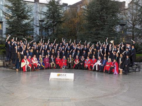 group graduation photo on amphitheatre UCC