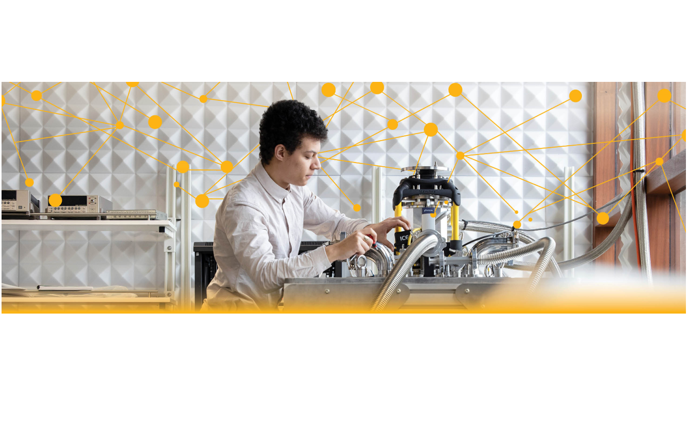 Student in lab operating machinery with background graphic