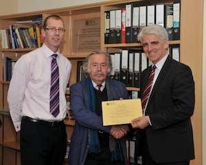 Dr. Tom Kelly receiving the SEFS 2012 Outstanding Lecturer Award