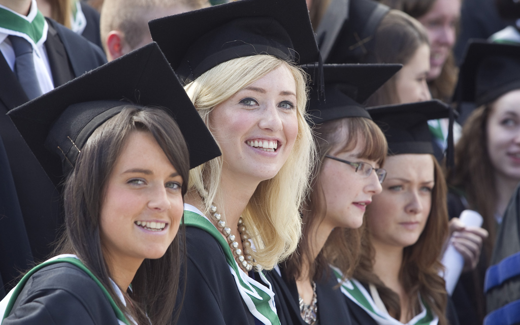 Group of female students graduating