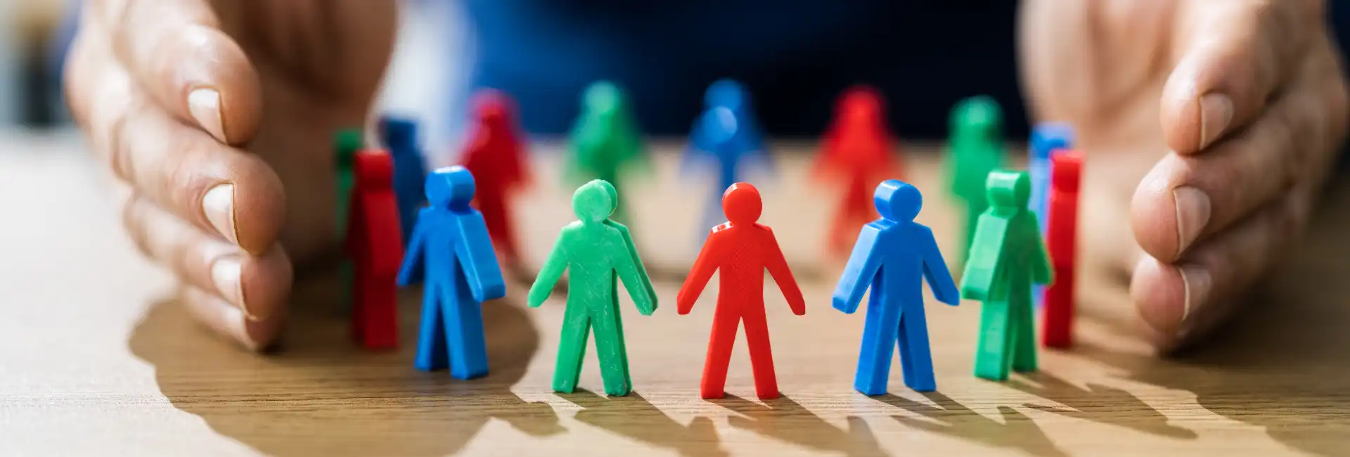 different coloured figures representing inclusion