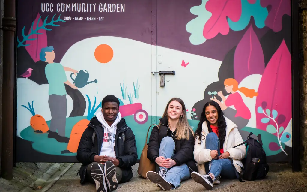 Students in front of Community Garden Mural