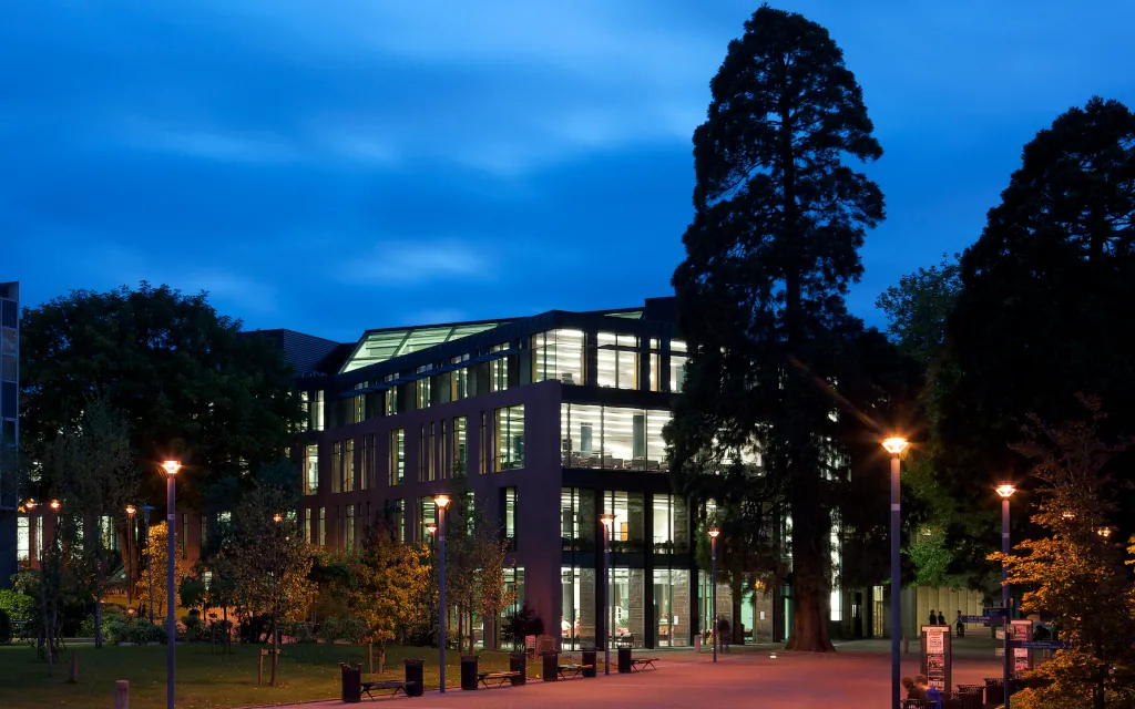 The UCC library, heart of research, teaching and learning at UCC, lit up at night