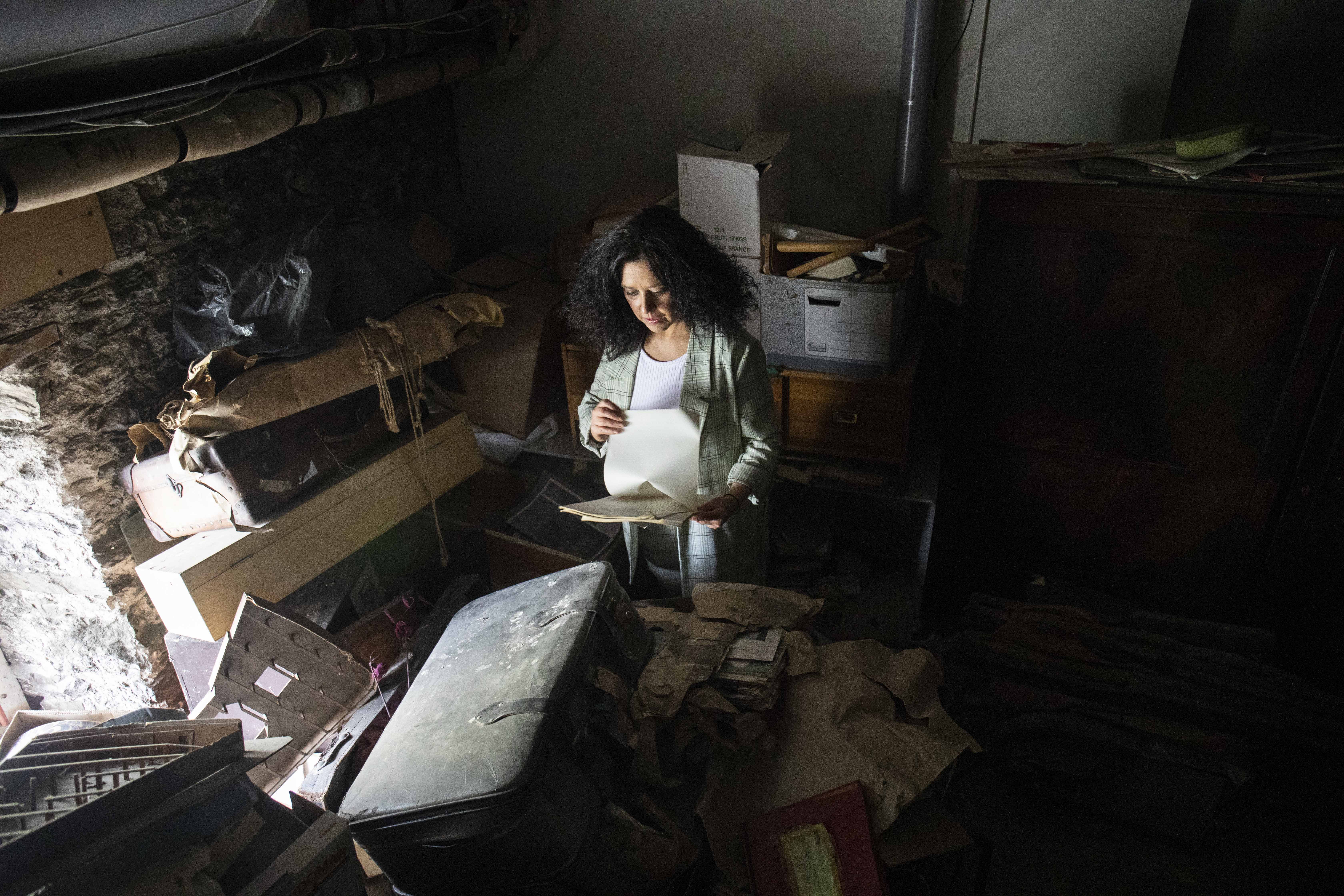 Regina Sexton examining the archives at Ballymaloe House