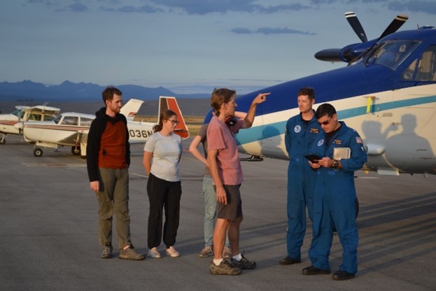 Steve Brown on runway with others