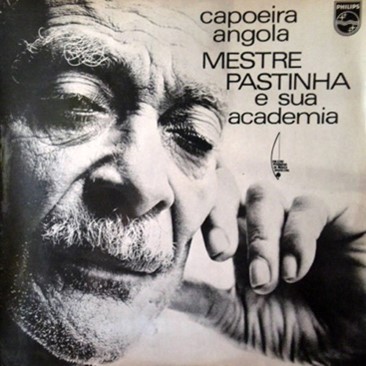 Album Cover, a close up of a moustachioed older man with the left side of his face resting on his hand