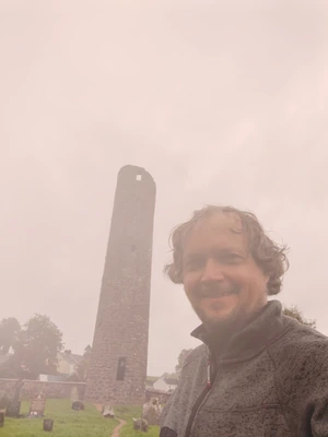 A person on a walk against a foggy background A person on a walk against a foggy background