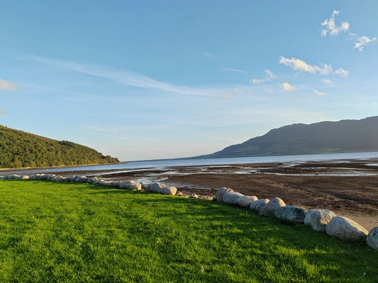 Green Irish countryside and coastline under a blue sky Green Irish countryside and coastline under a blue sky