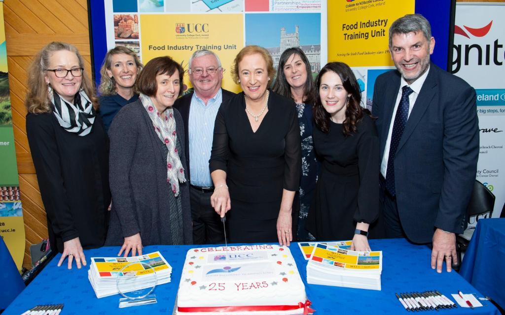 FITU team on 25th anniversay, with cake