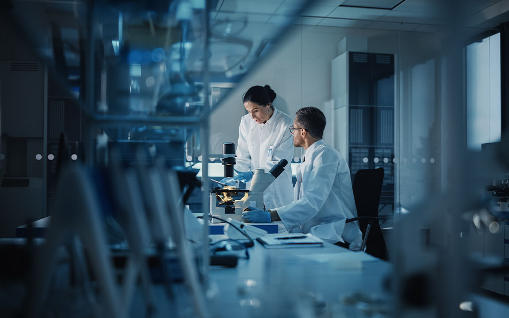 Two researchers working in a lab